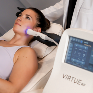 a woman had a Virtue RF on her face.